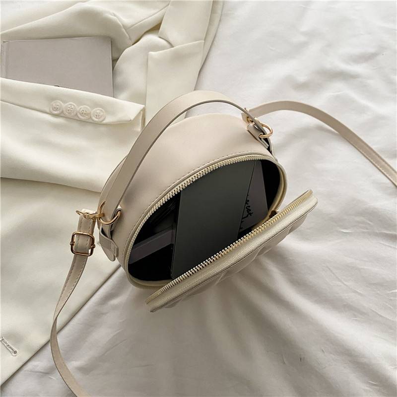 Divine Stitch - Leather Round Sling bag